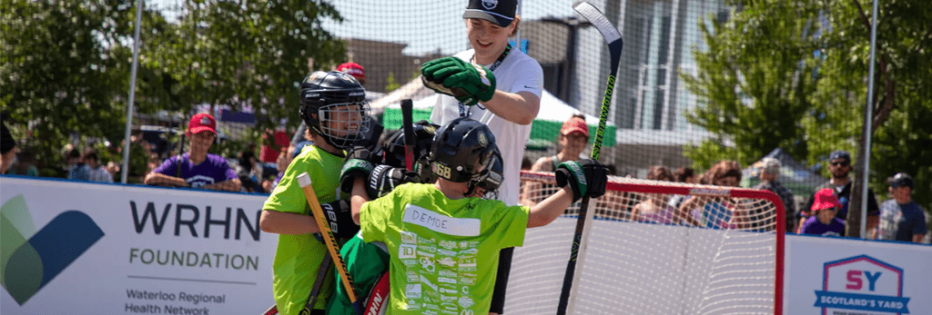 SY Hockey 2025 players celebrating a win